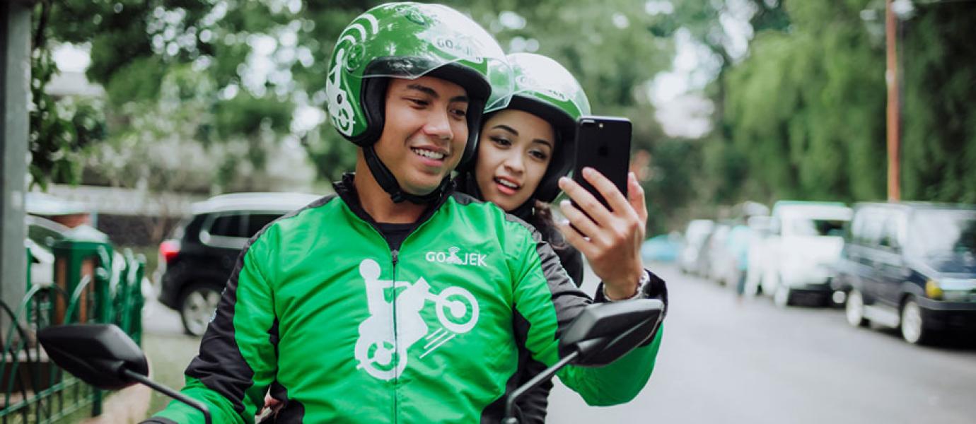 Bagaimana Strategi Go Jek Dapat Membuat Para Ojek Pangkalan Berpaling